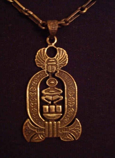 brass cartouche with the name of king Tut