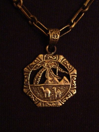 Camel and pyramids brass pendant