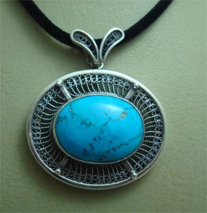 Filigree pendant with turquoise stone