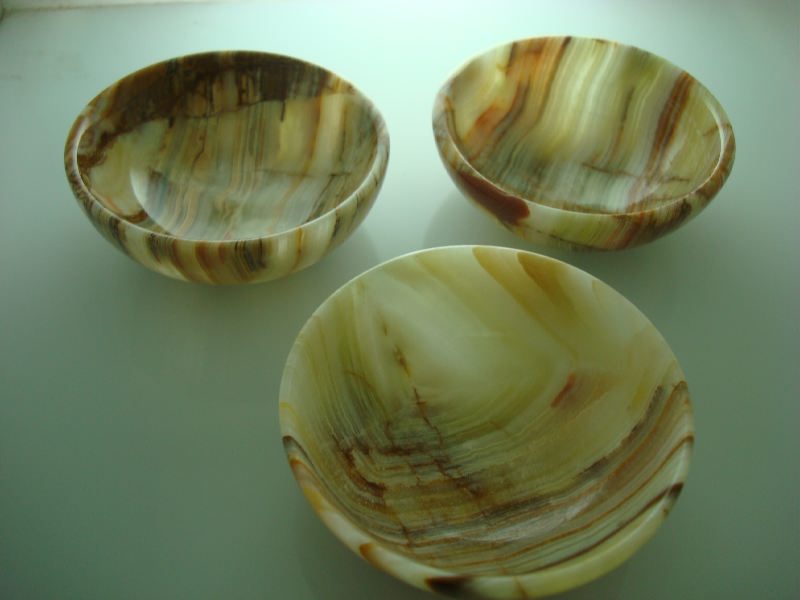 Set of three small alabaster bowls